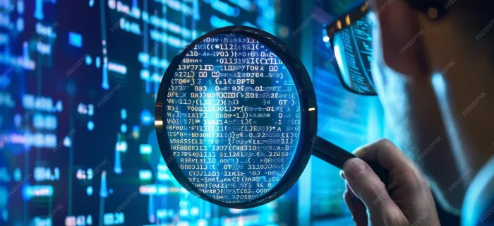 cybersecurity-specialist-examines-data-computer-screen-with-magnifying-glass-cybersecurity-specialist-investigating-data-breach_538213-73864